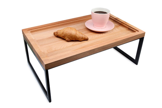Large beech wood serving tray with a big cut-out and metal frame for a modern industrial look. Perfect for serving meals, grilled meats, charcuterie or drinks. Solid oiled beech, sturdy and durable. Size: 530 x 325 x 25 mm.