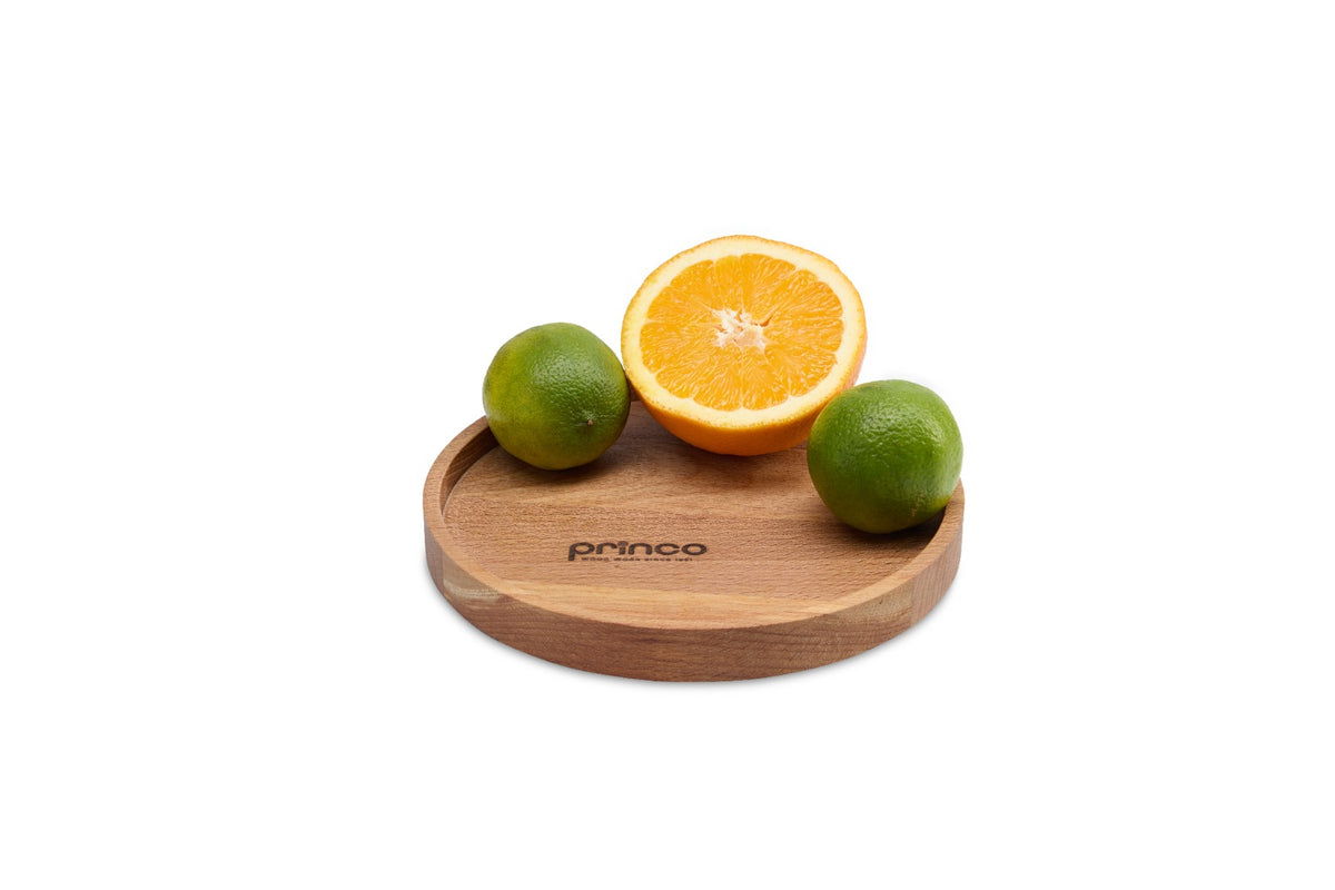 Small round beech wood tray, perfect for serving nuts, olives, sweets or as a coaster and decorative plate. Solid oiled beech, durable and food-safe. Size: Ø 190 mm, 20 mm thick.