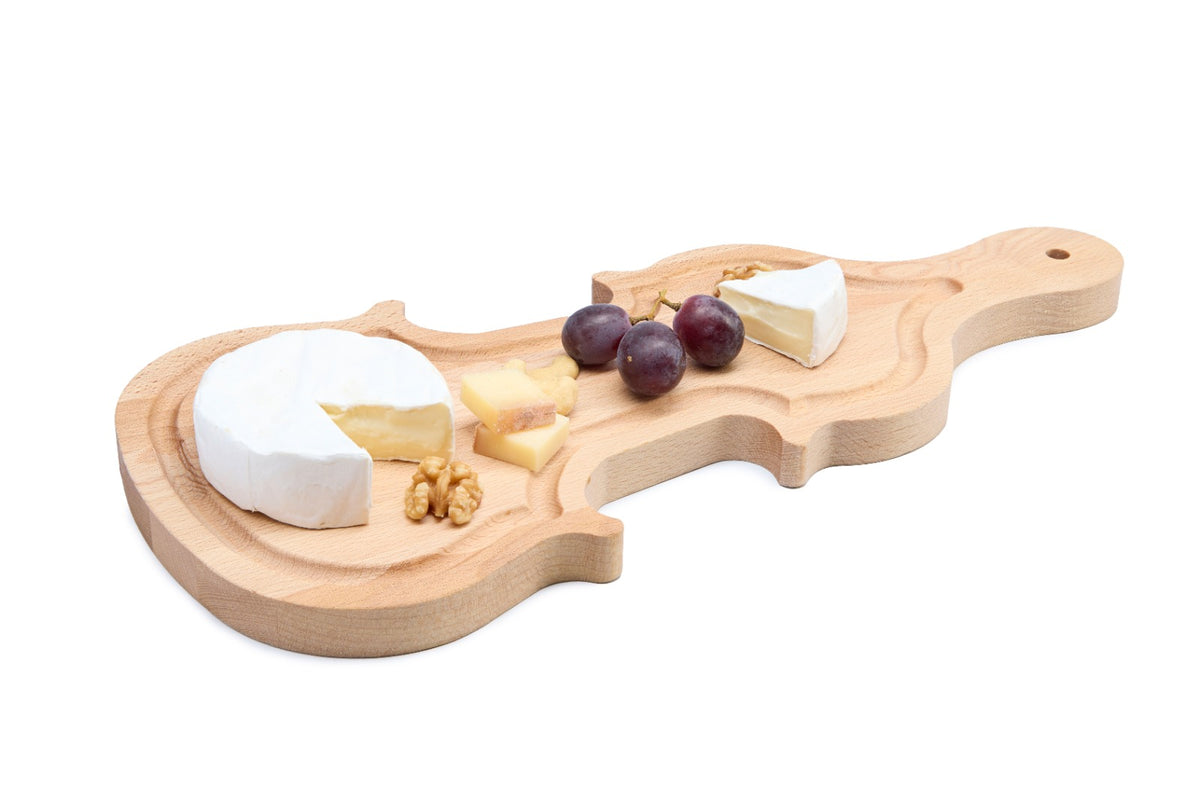 A unique violin-shaped beech wood board that turns any serving into a statement. Crafted from solid oiled beech, it is ideal for cheese, charcuterie and snacks, and makes an original gift for music lovers. Sturdy, knife-friendly and easy to maintain. Size: 400 x 280 x 20 mm.