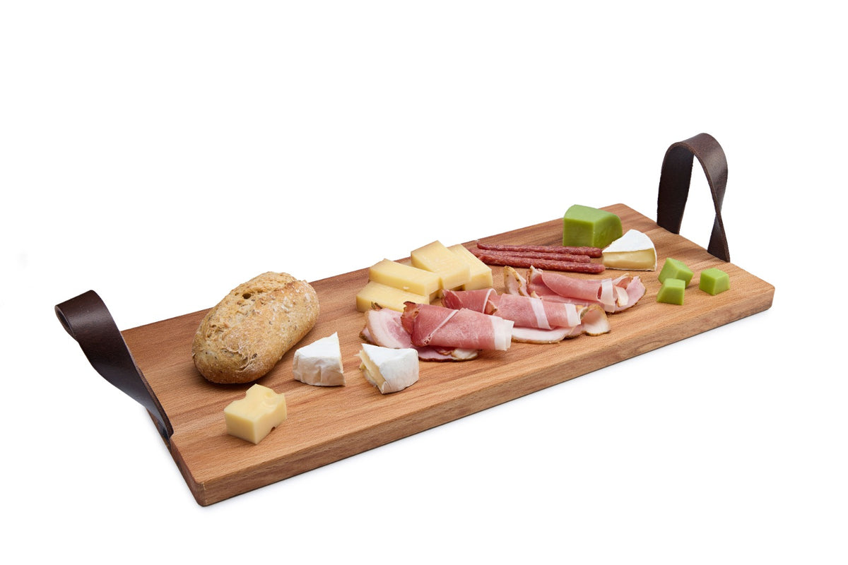 Stylish rectangular beech wood serving board with genuine leather handles. Perfect for serving charcuterie, cheese, bread or breakfast. Solid oiled beech with a modern rustic look for home and restaurant use. Size: 490 x 195 x 20 mm.